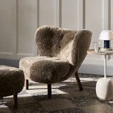 Armchairs & Pouffes